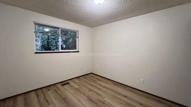Building Photo - Updated 2 Bedroom Featuring New Plank Flooring