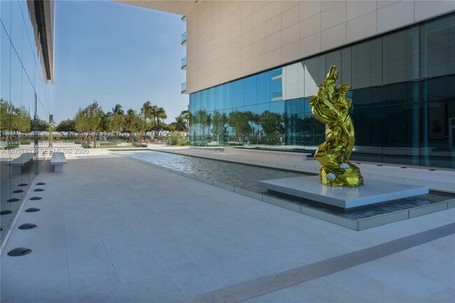 Building Photo - 10201 Collins Ave