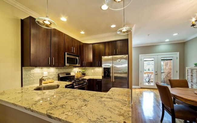 Building Photo - Fully Renovated Columbia Heights Row Home with Private Deck — 5 Min Walk to Metro!