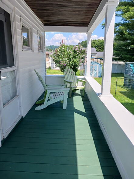 Covered private side porch, kitchen entry - 32 Duquesne Ave