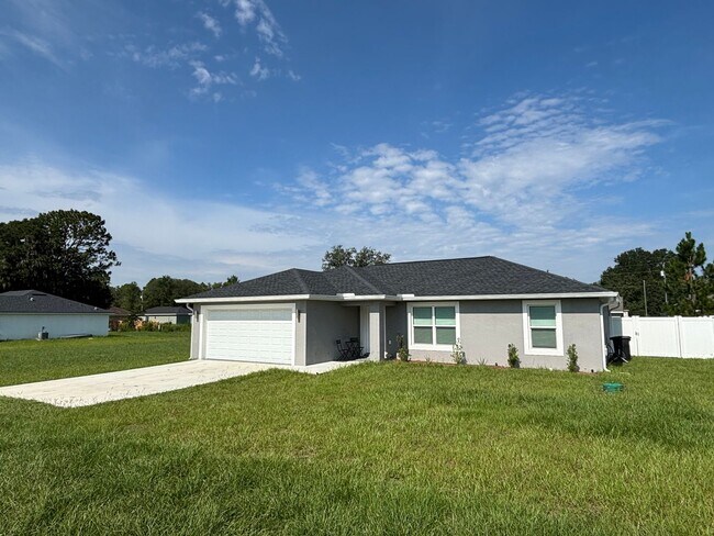 Building Photo - 2025 Newer House 3/2/2 fenced backyard. No carpet