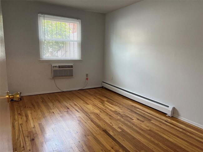 Building Photo - 210-15-210-41 41st Ave
