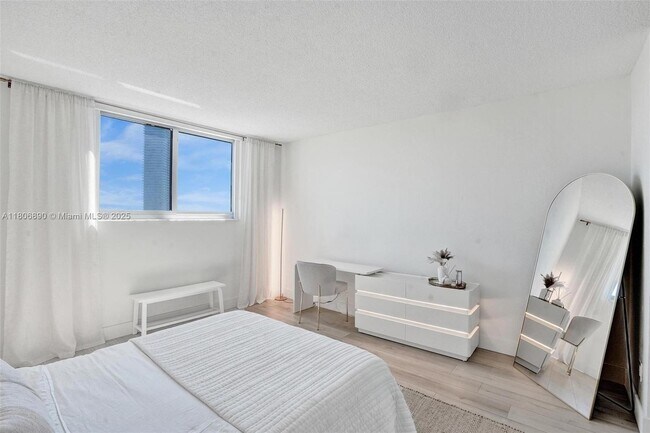 Building Photo - 19380 Collins Ave