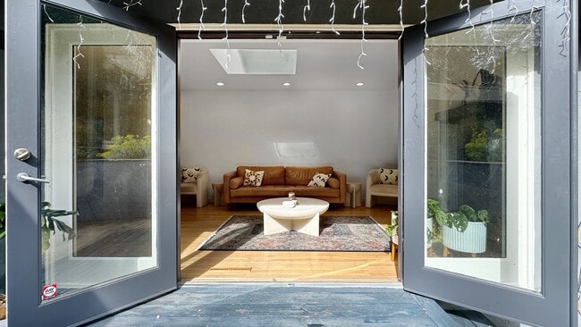 Building Photo - Light-Filled Home with Beautiful Garden & 2-Car Garage