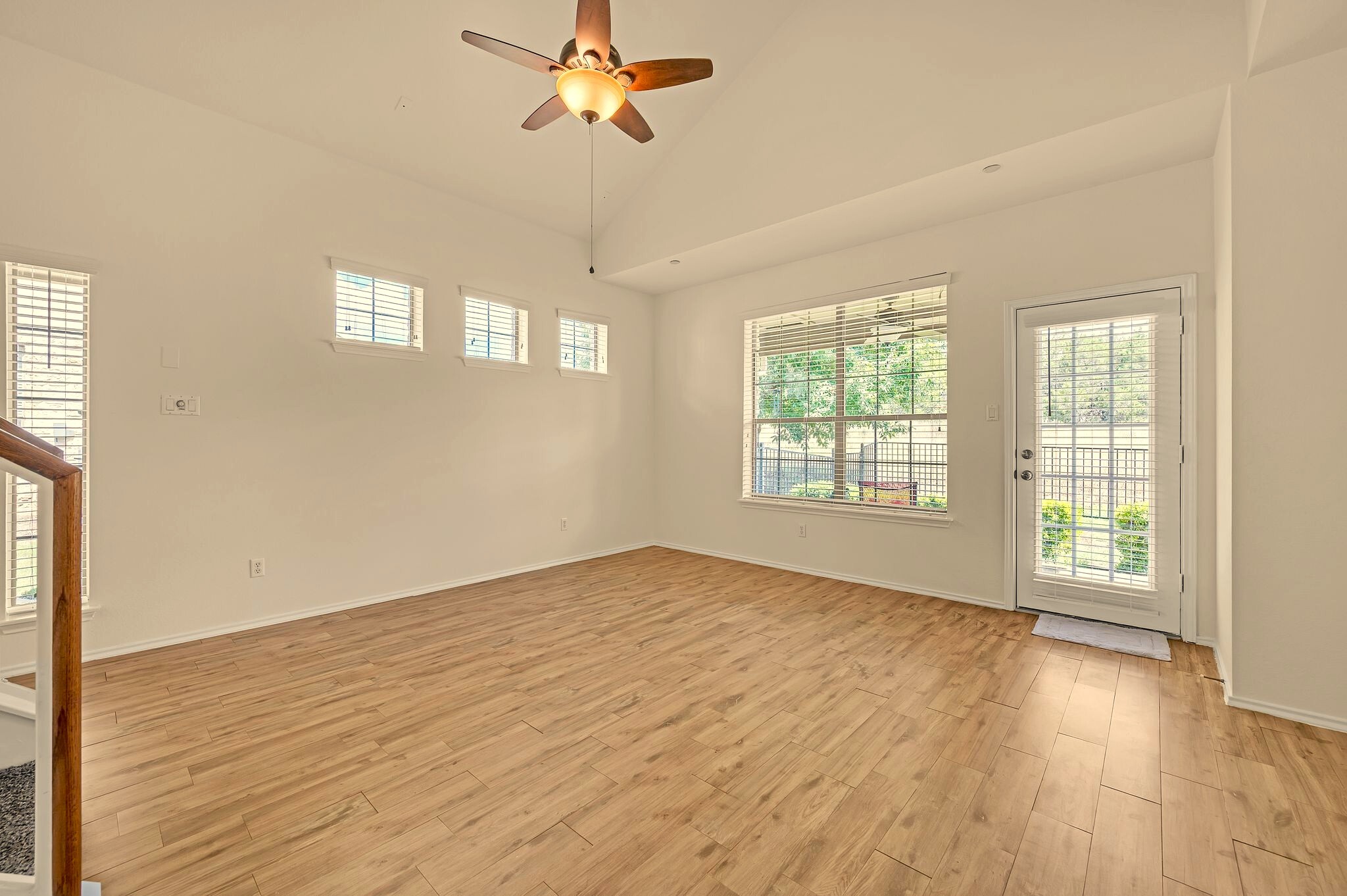 Living room with door to patio - 9201 Brodie Ln