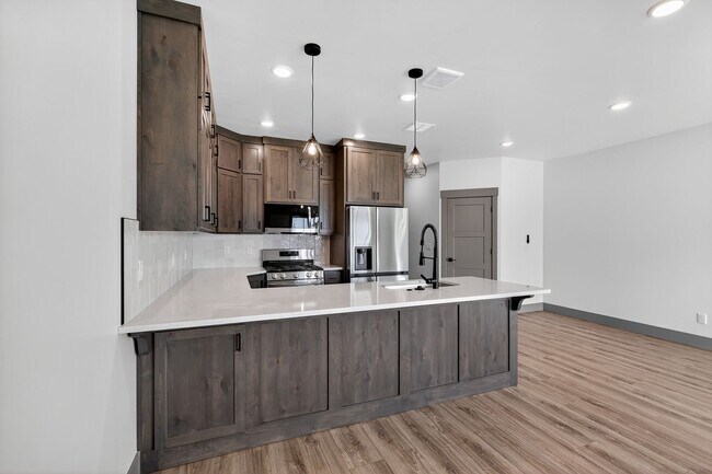 Building Photo - BRAND NEW3 BED 2.5 BATH TOWNHOME WITH 2 STALL GARAGE