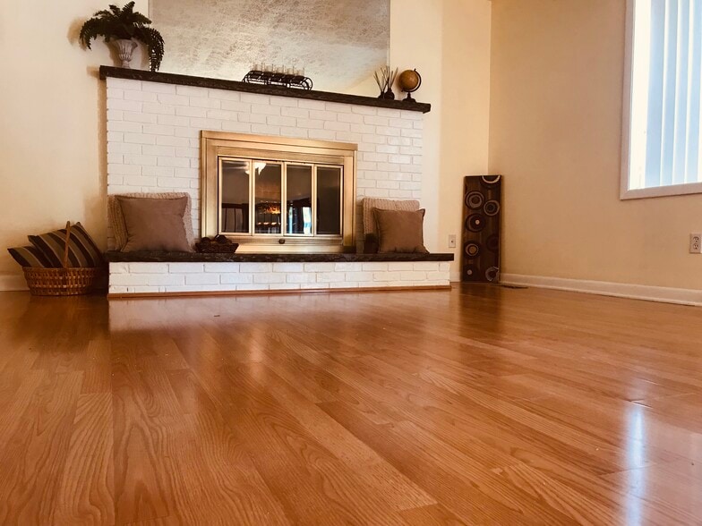 Living room features electric fireplace - 109 Geronimo Dr