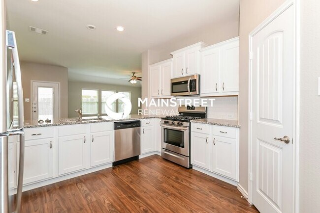 Building Photo - 4 Bedroom Pet-Friendly Home in FATE, TX with Main Street Renewal