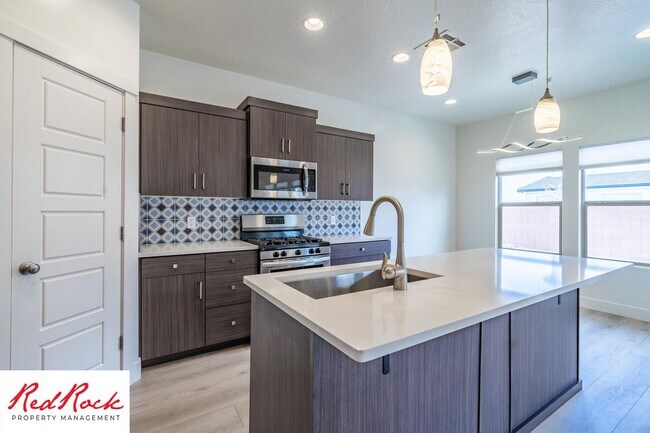 Building Photo - Comfort, Space & Style with a 3-Car Garage Small Dog Friendly!