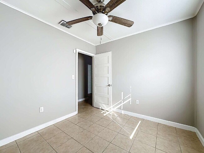 Building Photo - 6377 Lamar Dr