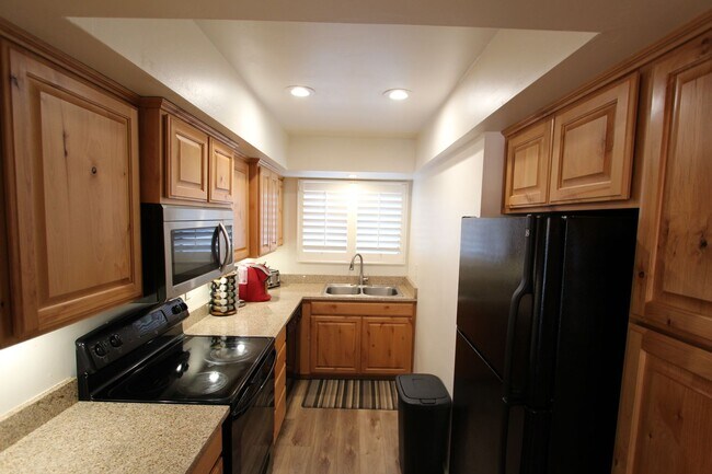 Building Photo - Fully Furnished 2BR Condo in Village at University Heights | Peaks Views + Covered Parking