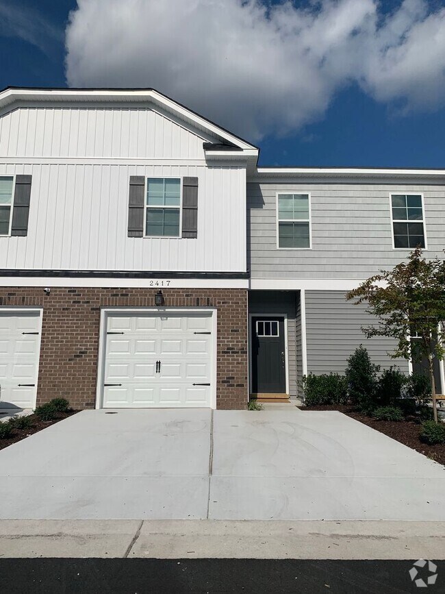 Building Photo - Three Bedroom Available