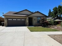 Building Photo - Newer single story home located in desirab...