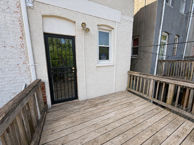 Building Photo - Home with Modern Kitchen, Finished Basement & Backyard Deck