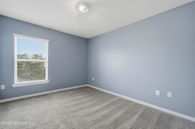 Building Photo - 6925 Ortega Woods Dr