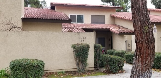 Building Photo - Updated Two Bedroom Condo with Warm Fireplace
