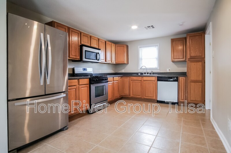 Building Photo - 1308 S 75th E Ave