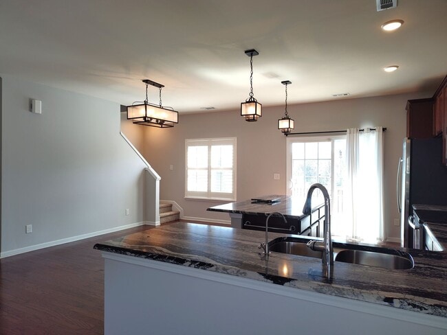 Building Photo - Charming, end-unit, townhome located in the Wrights Crossing Community!