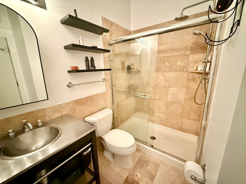 Primary ensuite bathroom with rain showerhead - 1240 4th St NW