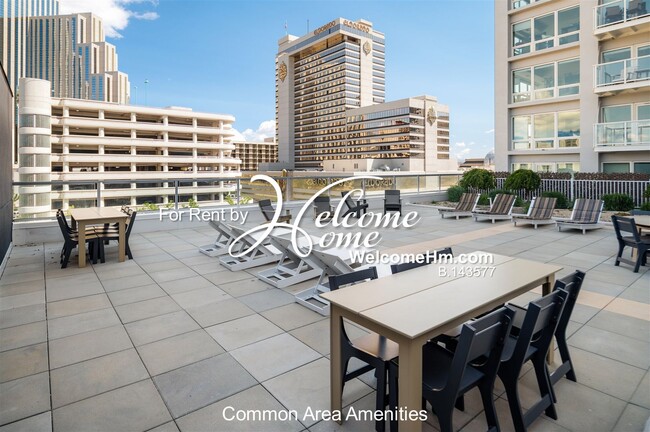 Building Photo - Coming Soon - Downtown High-rise Montage A...