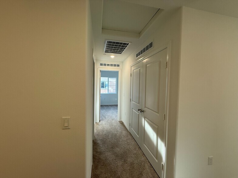 Hallway and laundry room - 7512 Fig Grove Ln