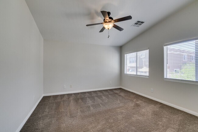 Building Photo - Great townhome in Henderson Gated Community with a 2 car attached garage and backyard