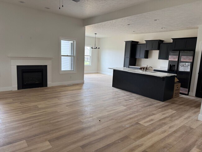 Building Photo - New Construction! West side location. 4br, 3bth, 2crg, Finished basement. All new stainless steel...