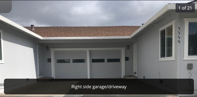 Right side garage and entry - 3359 Payne Ave