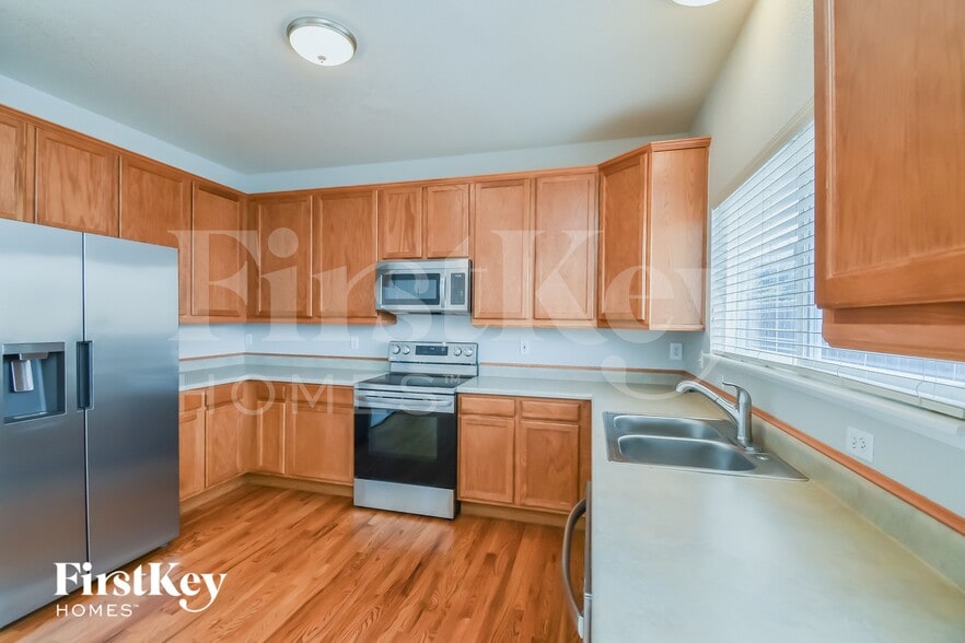 Building Photo - 5660 Rose Ridge Ln