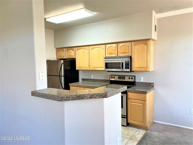 Building Photo - 7050 E Sunrise Dr