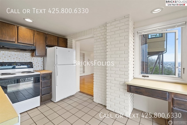 Building Photo - Charming Tudor Retreat: Your Perfect Home ...