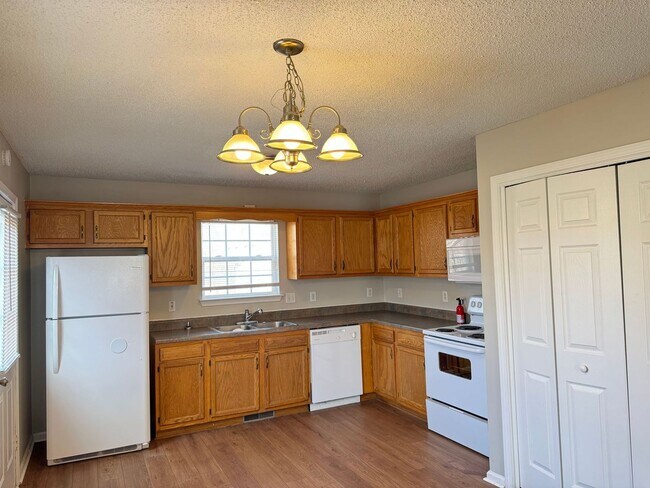 Building Photo - Lovely 3 Bedroom 2 Full Bath Home with? Large Deck & Fenced in Back?yard!