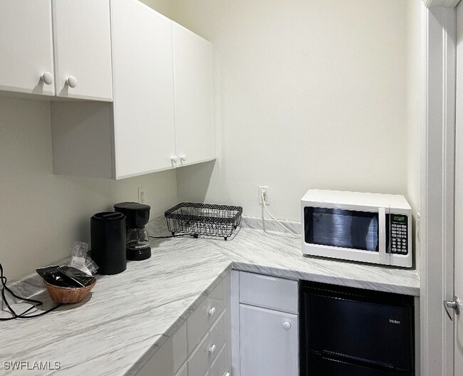 Building Photo - 25000 Tamiami Trl E