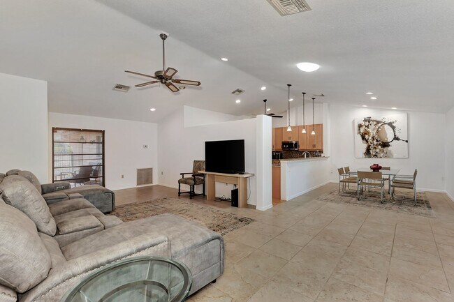 Building Photo - BEAUTIFUL 2 BEDROOM 2 BATHROOM + A DEN VILLA WITH GORGEOUS LAKE VIEWS!