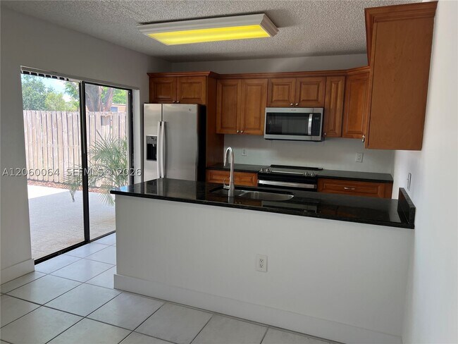 Building Photo - 9105A SW 19th Pl