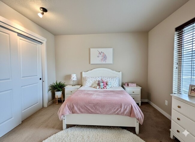 Building Photo - Modern 4-Bedroom Gem | Maintenance-Free Living & Private Side Yard!