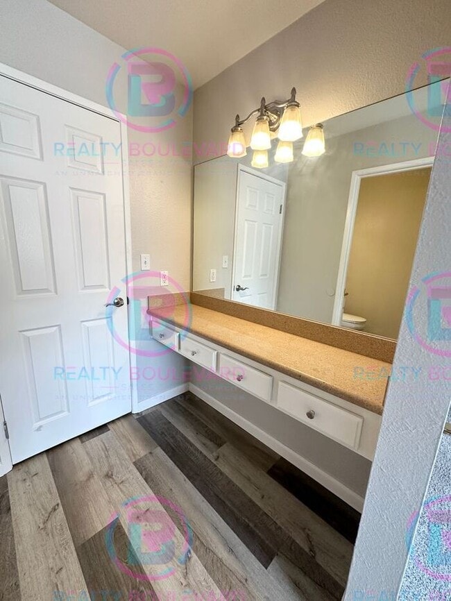 Building Photo - Contemporary 2-Bed Condo with Garage & Poo...