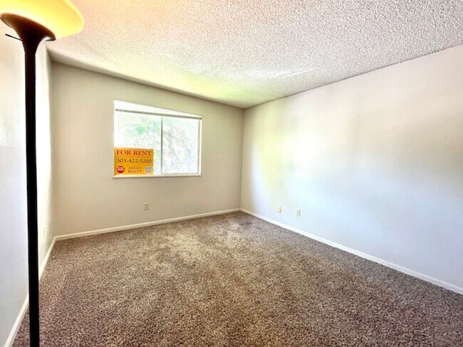 Building Photo - 2-Bedroom in Woodside Condos