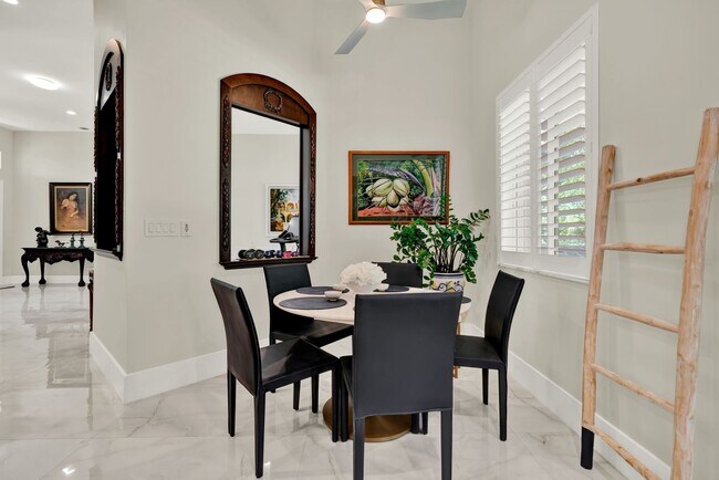 Building Photo - Elegant 4-Bedroom Pool Home in Exclusive G...