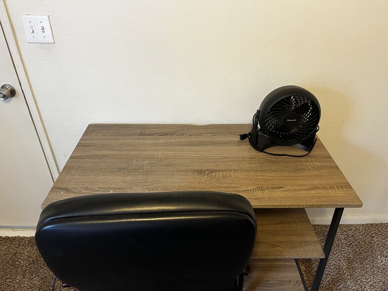 Desk and fan - 521 Southwest Pky