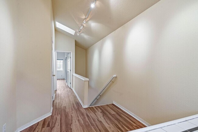 Building Photo - $500 move-in special! Unique 2-bdrm/2.5-bath duplex w/ A/C—Private patio, storage, garage w/ wash...