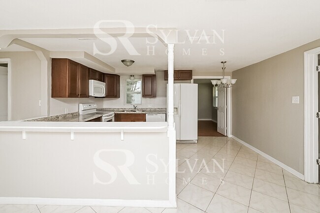 Building Photo - The living is easy in this 3 bedroom, 1 bathroom home
