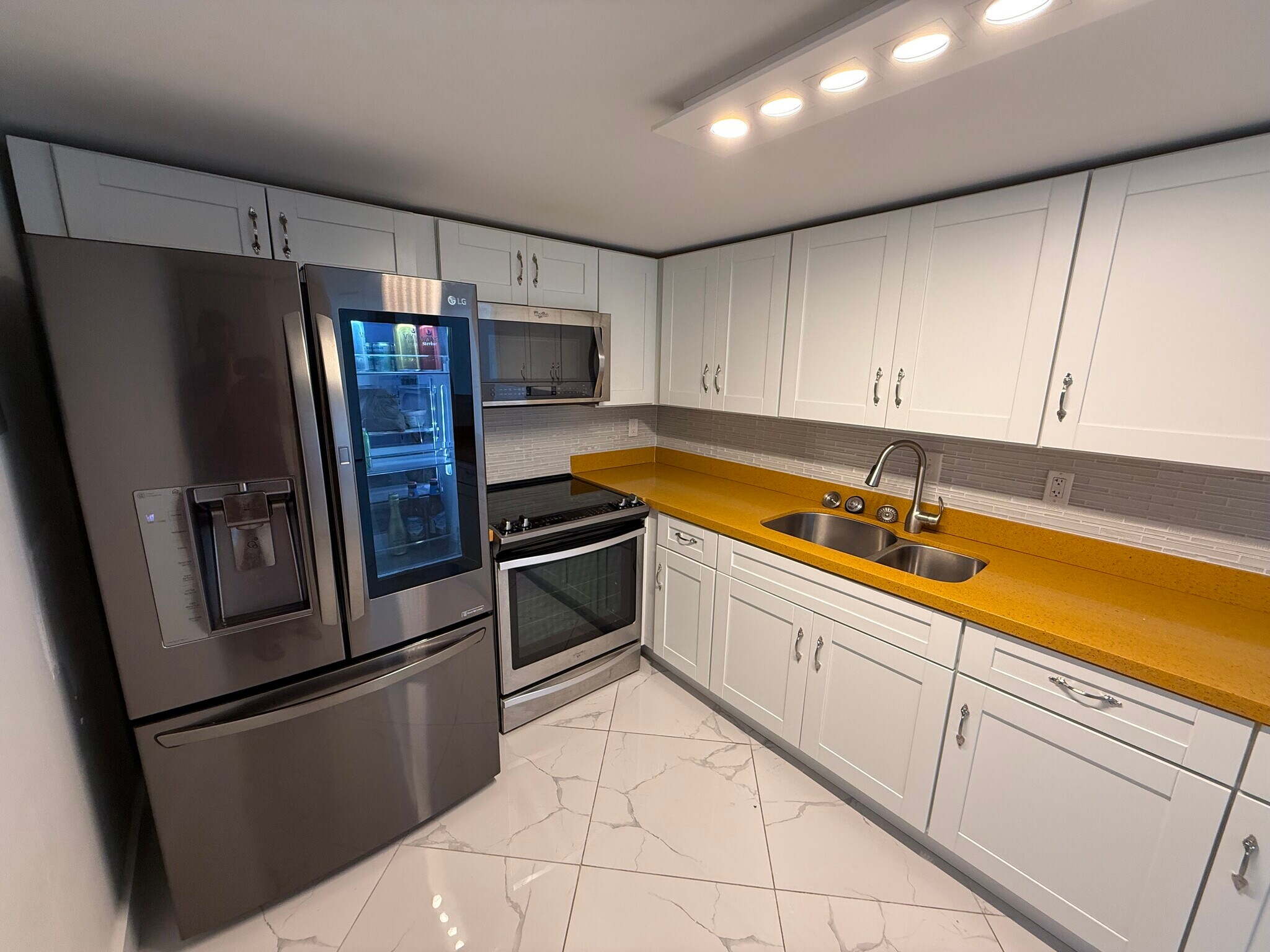Open-concept KITCHEN - 780 NE 69th St