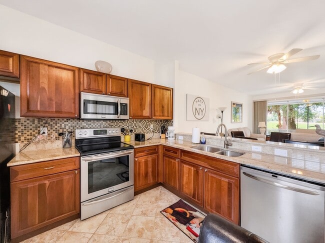 Building Photo - Beautifully furnished 2BR/2BA first-floor condo