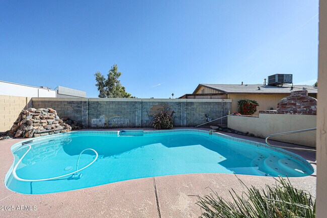 Building Photo - 3408 W Port Au Prince Ln