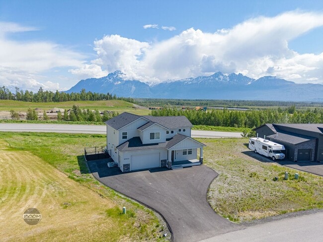 Building Photo - Premium 4BR Rental in The Ranch | Stunning Mountain Views | Easy Community Location | Automatic G...