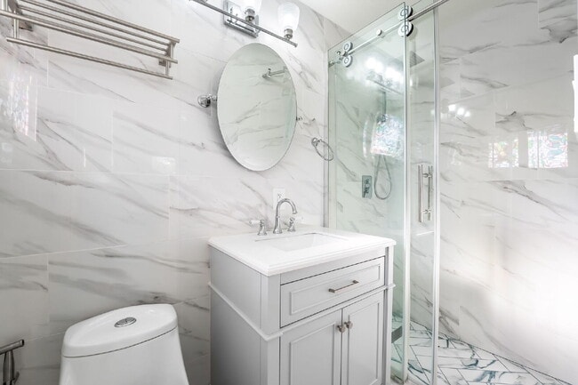 Building Photo - Single Story,  Totally Renovated , 3 bedroom, 2 bathroom Home with  extensive privacy and gated h...