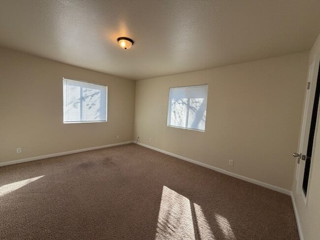 Building Photo - New Paint AND a Yard with a picket fence!