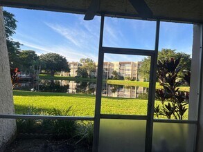 Building Photo - Pretty 1st Floor Davie Condo