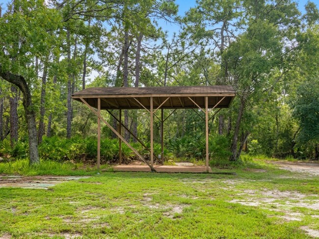 Building Photo - 10300 Woodland Waters Blvd
